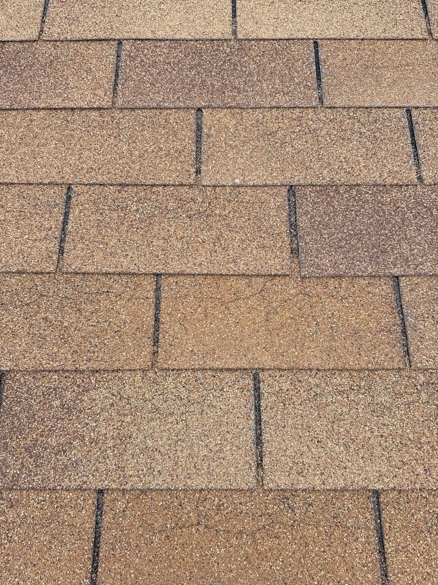 Close-up of a finished architectural asphalt shingle roof by Paramount Roofing