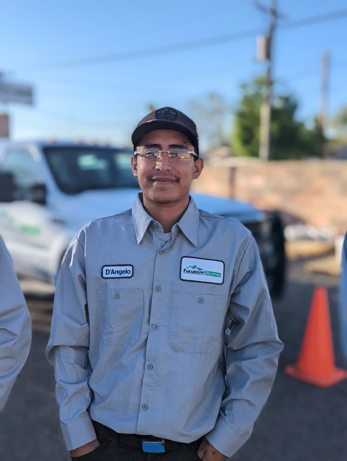 A Paramount Roofing crew member