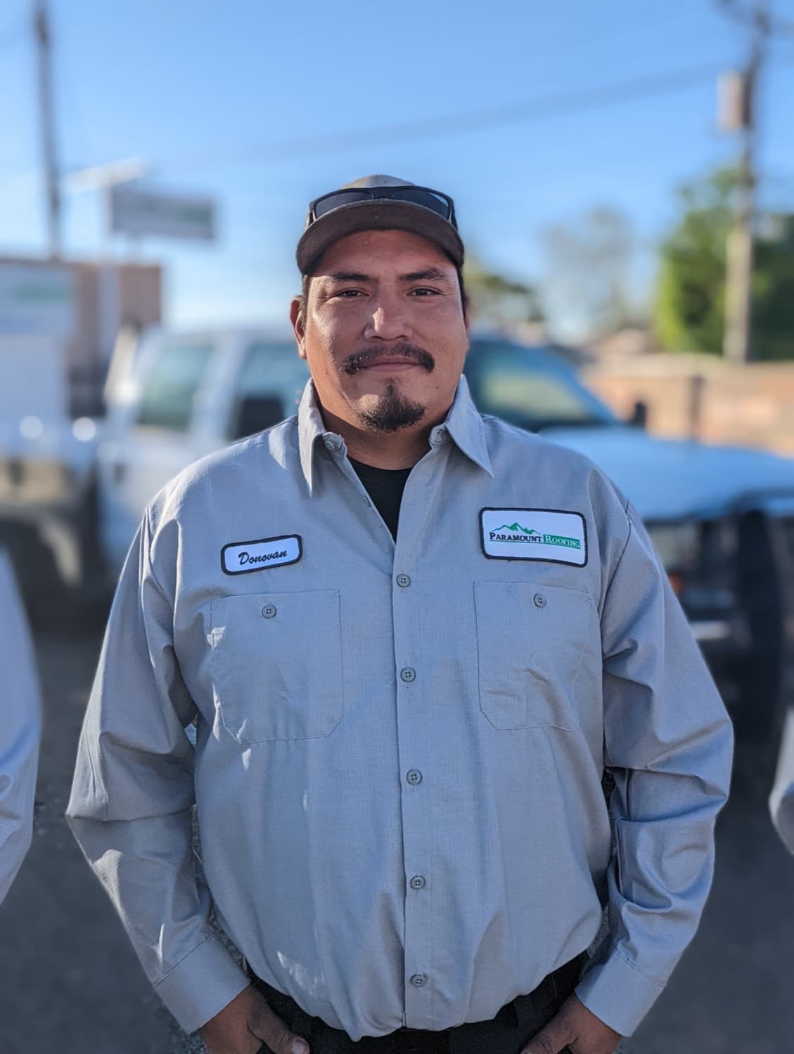 A Paramount Roofing crew member