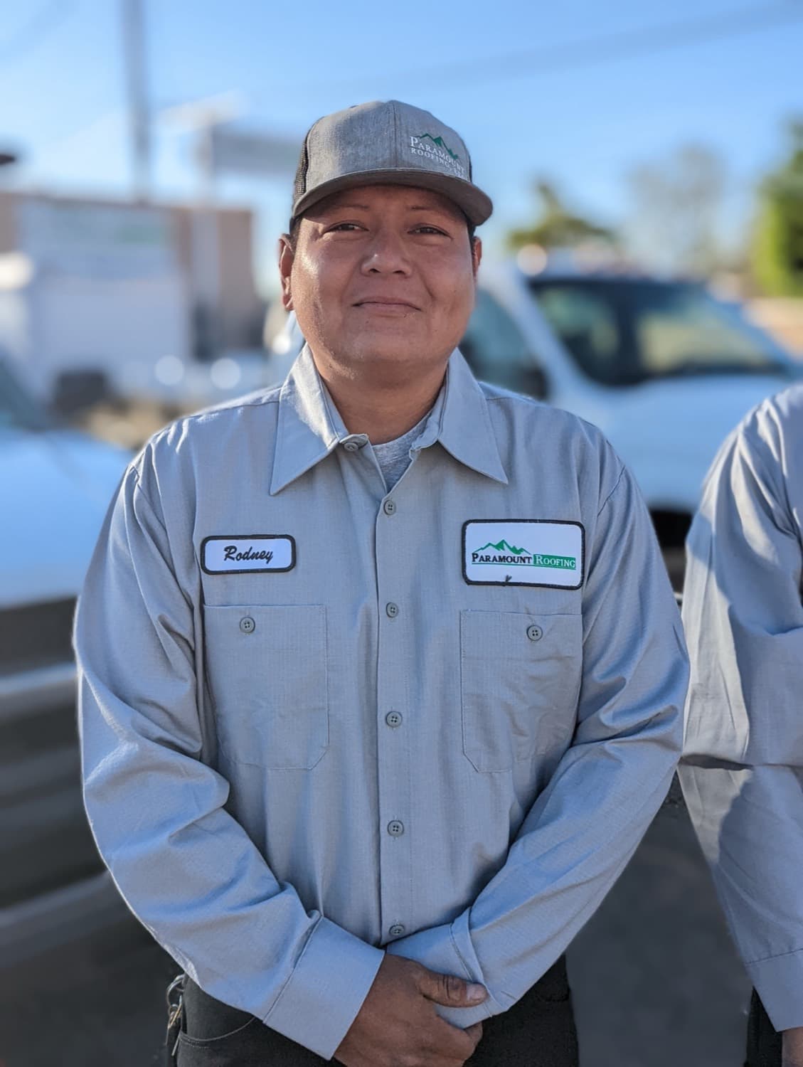 A Paramount Roofing crew member